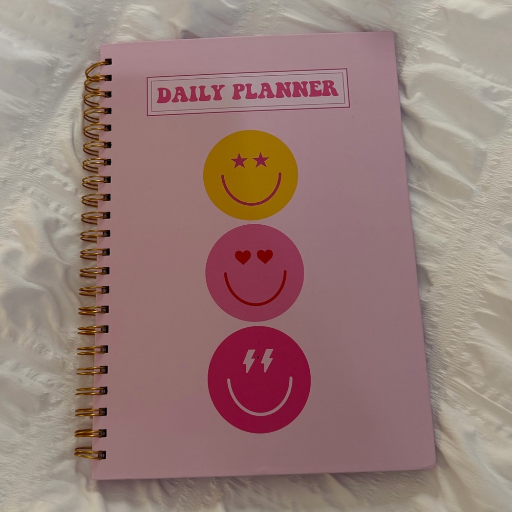 Pink Daily Planner with Smiley Faces